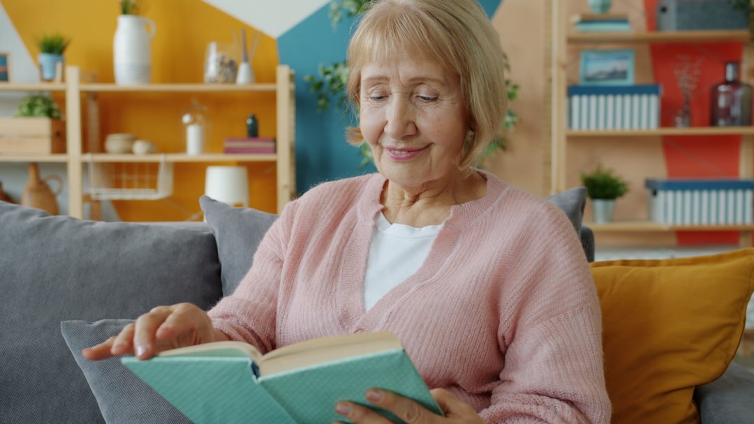 elderly woman reading mystery